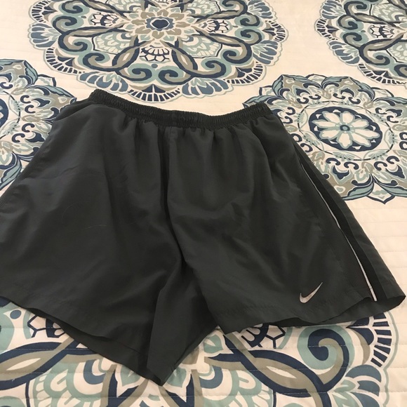 Men’s Nike Dri Fit 5 inch running short. Dark gray